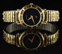 Gucci ladies wristwatch ref. 3000L with gold dauphine hands, black dial, Roman numerals to the