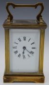 Brass cased bevelled glass carriage clock, H15cm