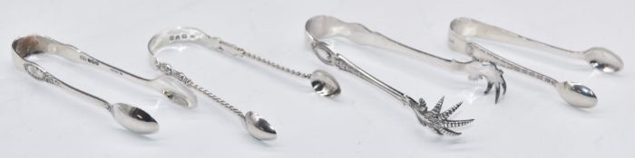 Four sets of hallmarked silver sugar tongs, weight 84g