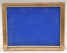 Hallmarked silver photograph frame to suit 8 x 6 inch photo, with blue velvet easel back, Birmingham