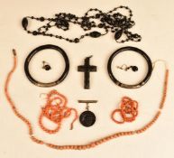 Victorian Whitby jet cross, French jet and coral necklaces