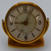Jaeger (LeCoultre) travelling desk or alarm clock with luminous hands, gold hour markers, cream dial