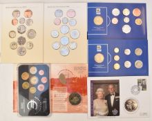 A collection of various coin presentation packs to include Royal Mint 'My First Coins', 2010 FIFA