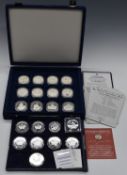 Westminster coin case containing nine Canadian silver dollar coins, with certificates and twelve