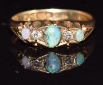 An 18ct gold ring set with opals and diamonds, Chester 1905, 3g, size M