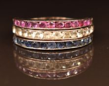 A 9ct gold eternity ring,  the band set with white sapphires and emeralds, the hinged moveable