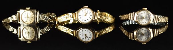Three 9ct gold ladies wristwatches Tissot, Rotary and Majex, all on gold plated bracelets.