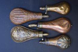 Five various copper and brass powder flasks including one Boche of Paris, one Sykes and another with