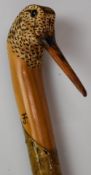 Ian James carved and painted wooden walking stick with handle in the form of a woodcock, L133cm