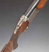 Nikko Model 5000 II 12 bore over and under ejector shotgun with engraved locks, trigger guard,
