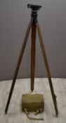 Military theodolite number B3695 in fitted wooden case stamped WFS B3695, with canvas carry case and