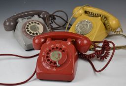 Three retro telephones including red, cream and grey examples and 746F and 706L