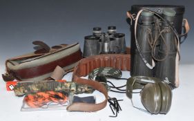 A collection of gun and shooting accessories including Napier padded shotgun or rifle slip, canvas