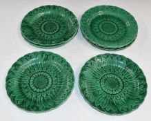 Seven 19thC Wedgwood Majolica Sunflower plates, impressed marks verso, diameter 22cm
