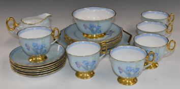 Approximately twenty one pieces of Shelley tea ware decorated with flowers, probably Harebells,