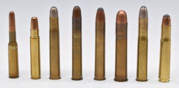 Eight deactivated big game rifle cartridges comprising .577 Nitro, .500-465, .500-450, .500