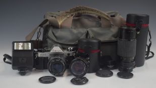 Canon AE-1 Program 35mm SLR camera with Sigma 1:2.8 f=28mm and 1:4.5 f=70-210mm and Canon 50mm 1:1.8