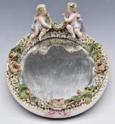German porcelain hanging mirror with figural putti decoration, probably Sitzendorff or Volkstedt,