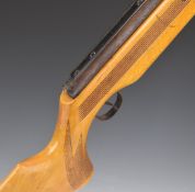 Relum Tornado .22 air rifle with chequered semi-pistol grip, raised cheek piece, adjustable sights