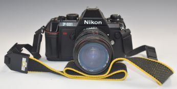 Nikon F-301 35mm SLR camera with Tokina 28-70mm  1:3.5-4.5 lens
