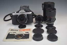 Pentax K1000 35mm SLR camera with Pentax 1:2.8 28mm and 1:2 50mm and Tamron 35-80mm 1:2.8-3.5 lenses