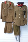 Two British Army khaki No 2 dress uniforms, one for the Rifles Regiment with Colonel rank insignia