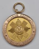 Scots Guards Association London Branch 9ct gold badge inscribed E C T Cutler, M.C 1945