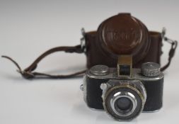 Miniature Mycro 16mm spy camera with 20mm lens, in original leather case. The vendor's father used
