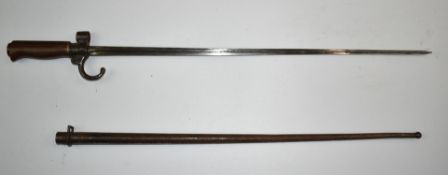 French 1886 pattern Lebel bayonet with 52cm cruciform blade and scabbard. PLEASE NOTE ALL BLADED