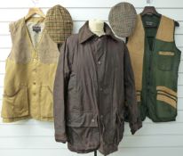 A collection of shooting clothing comprising two Top Gun shooting waistcoats size M, a John