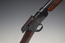 Winchester Model 62 .22 pump-action rifle with adjustable sights and 23 inch barrel, overall