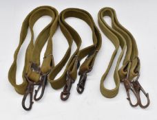 Three Bren canvas machine gun slings with metal fittings.
