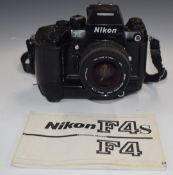 Nikon F4 35mm SLR camera serial number 2142441 with MB 21 battery pack and Sigma 28mm 1:1.8 lens
