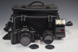 Nikon F-401s 35mm SLR camera with 1:3.5-4.5 35-70mm and 70-210mm 1:4-5.6 Sigma lenses, flash,