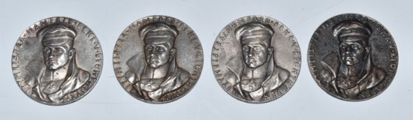 Four German white metal medallions impressed 'Der Rote Kampf Flieger' and Rittmeister Manfred Frhr V