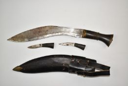 Kukri knife with 29cm blade and leather sheath. PLEASE NOTE ALL BLADED ITEMS ARE SUBJECT TO OVER