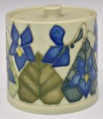 Dennis Chinaworks covered circular box decorated with violets, 'Trial 5' and '2001' to base, H8cm