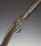 A pair of decorative flintlock guns each with 31 inch barrel, overall lengths 120cm.