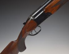 Baikal NK-12 12 bore over and under shotgun with engraved locks, top lever and underside,