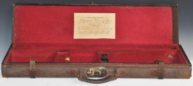 Leather and canvas bound shotgun case with fitted interior and 'Under Royal Patronage Edwinson Green