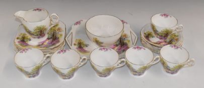 Approximately twenty one pieces of Shelley tea ware decorated in the England's Charm pattern