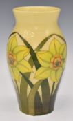 Dennis Chinaworks signed limited edition 30/81 baluster vase decorated with daffodils, H21cm