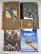 Two scrapbooks with cut out pictures of fighting aircraft, together with two publications comprising
