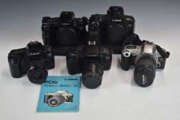 Canon 35mm SLR cameras and camera bodies comprising EOS 3 and EOS 5 with power drive boosters, EOS