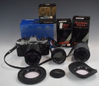 Olympus OM10 35mm SLR camera with 50mm 1:1.8 Olympus lens and 28-70mm 1:3.5-4.5 and 70-210mm 1:4.0-