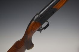 Baikal 12 bore single barrelled shotgun with named and engraved lock, chequered semi-pistol grip and