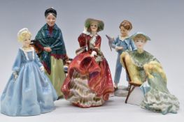 A collection of Royal Doulton and Royal Worcester figures including Biddy Pennyfarthing