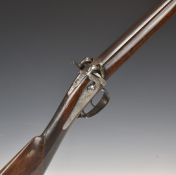 Rossi Italian double barrelled over and under percussion hammer action gun with engraved locks,