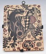 Socarrat tile by Enrique Sanatonio with script verso 'Siglo XV Pintodo A Mamo', with removable metal