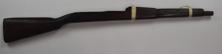 Springfield M1903 bolt-action rifle stock with storage compartment to the chequered butt plate and